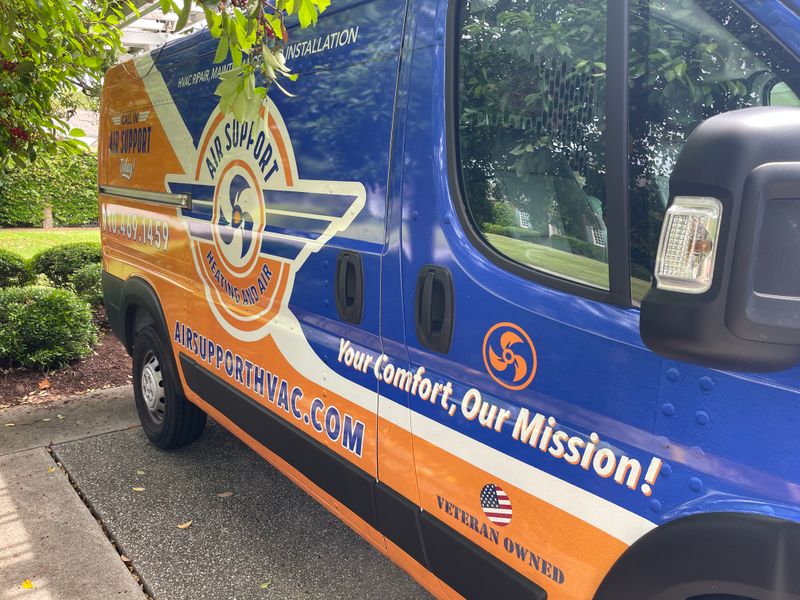 Air Support Heating and Air branded service van with Your Comfort Our Mission tagline