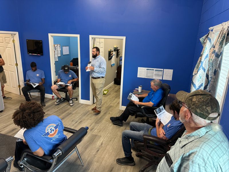 Air Support Heating and Air full team meeting at the company office in Wilmington NC