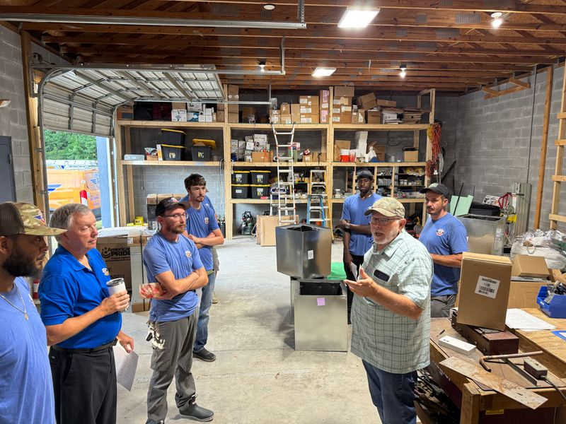 Air Support team in the warehouse for hands-on HVAC equipment training